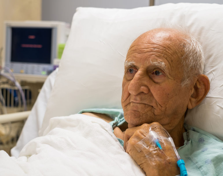 medical-mistake-Baltimore-MD-Elderly 80 plus year old man recovering from surgery in a hospital bed